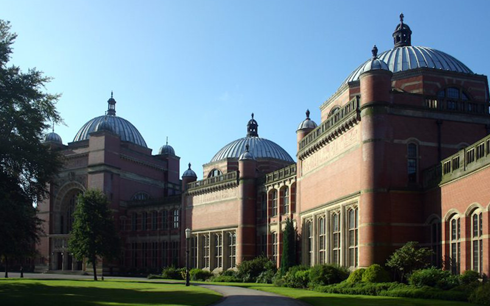 Elegant red-brick UK university building symbolizing joint degree opportunities – The Red Pen