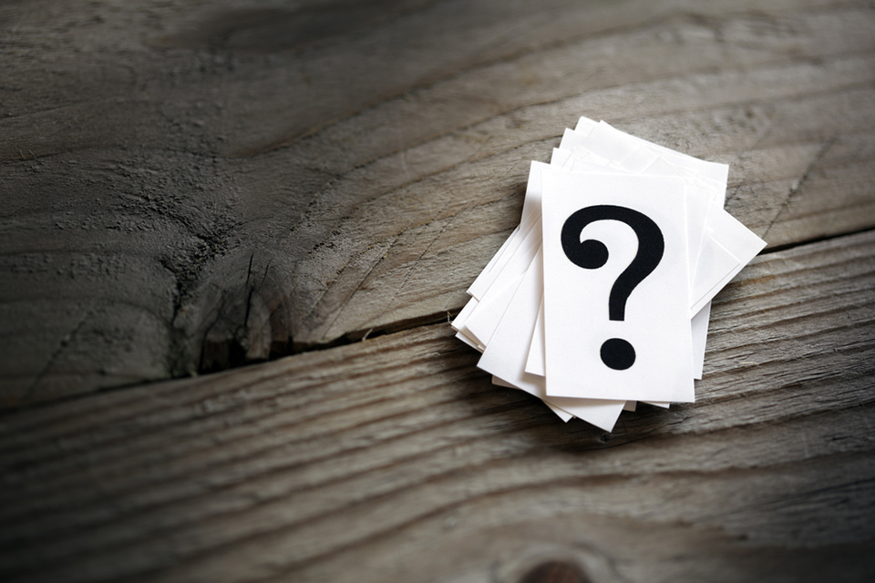 Close-up of question mark cards, representing the frequently asked questions regarding MBA applications – MBA Applications – Frequently Asked Questions Part 1 | The Red Pen