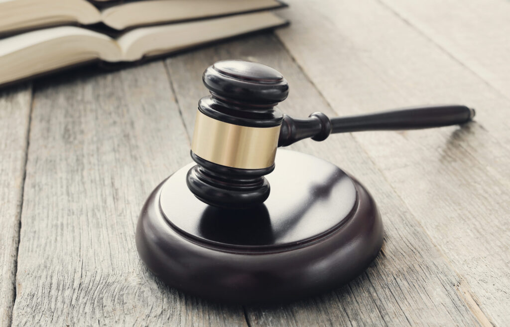 Legal gavel resting on table highlighting late entry opportunities for law courses in the UK – The Red Pen