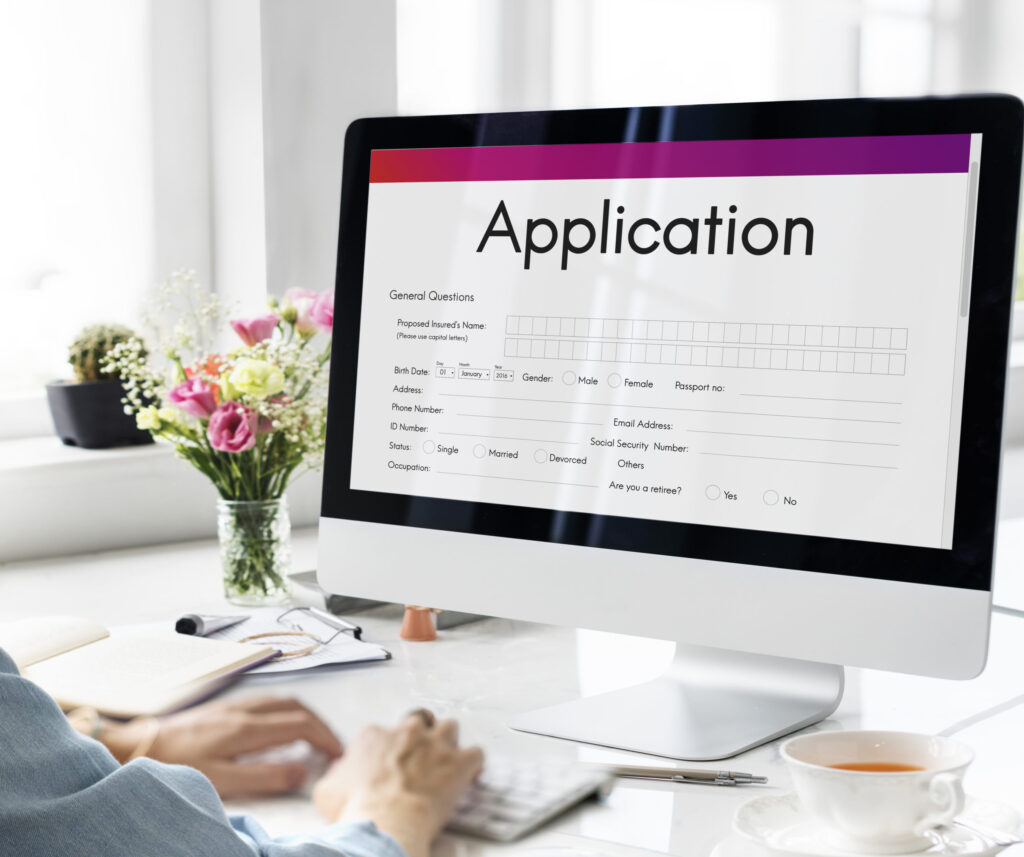 Application form displayed on a computer screen as part of a postgraduate admission guide, by The Red Pen