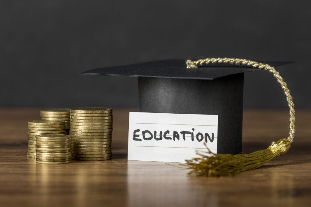 Education costs and scholarship opportunities in the US for international students illustrated by cap and coins by The Red Pen