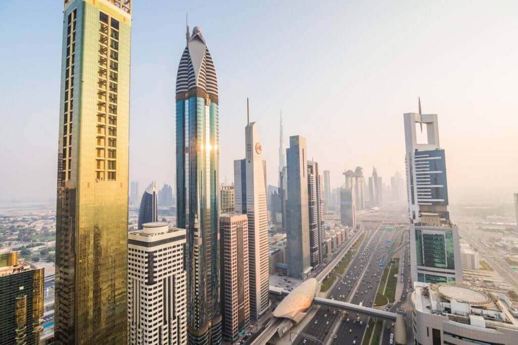 Aerial view of Dubai's futuristic cityscape, highlighting top reasons for schooling in the city - The Red Pen