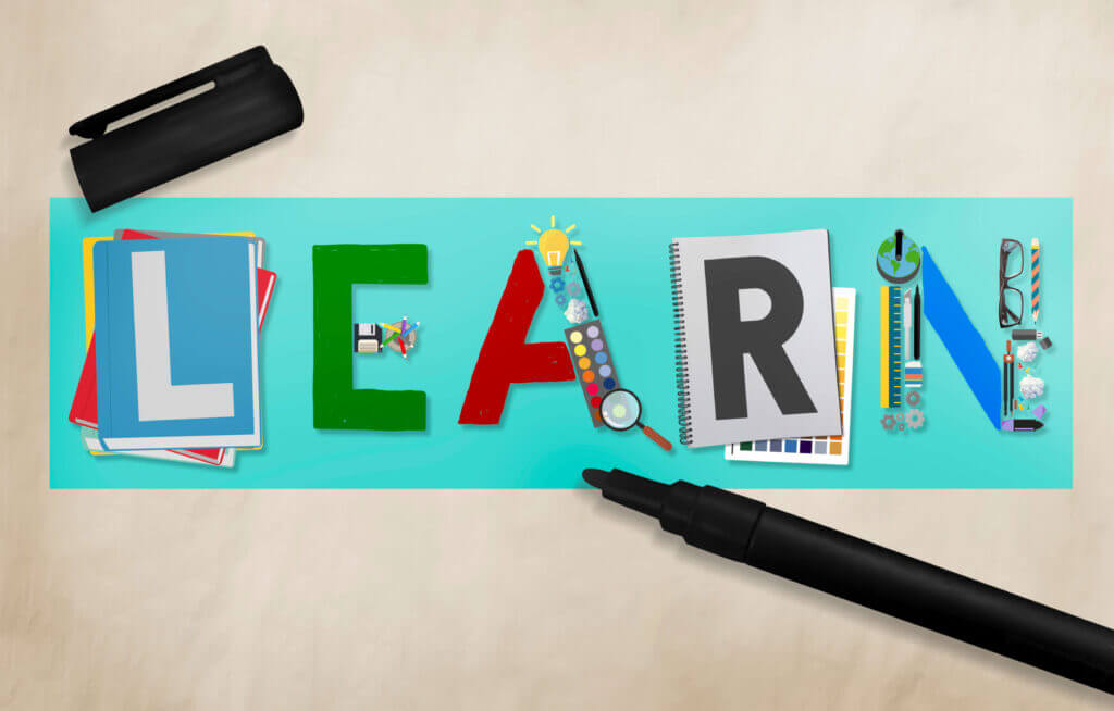 Innovative learning concept with colorful letters and educational icons, The Red Pen