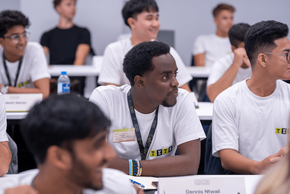 Young adults from various backgrounds attending a seminar at a future-ready university, The Red Pen